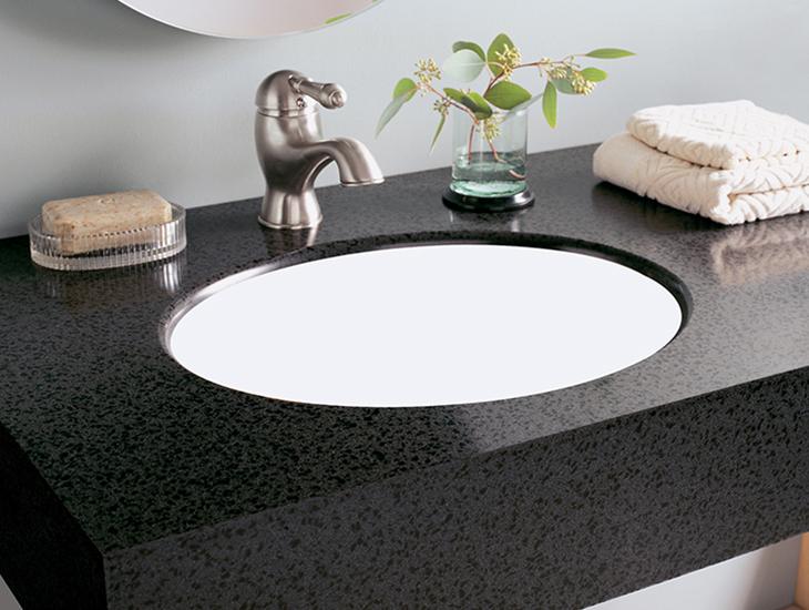 Bathroom sink with soap and plant L075 501 Black Lava Formica Solid Surfacing